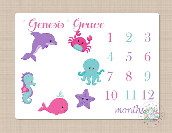 http://sweetbloomsdecor.com/cdn/shop/products/sea-animals-milestone-blanket-ocean-baby-girl-under-the-sea-bedding-whale-sea-horse-octopus-crab-star-fish-pink-purple-teal-b342-milestone-blankets_grande.jpg?v=1607047191