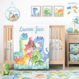 Nursery with dinosaur-themed bedding and decor, featuring the name 'Lawson Jace'.
